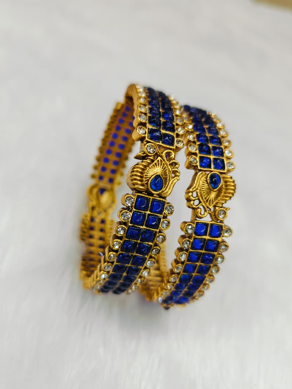 Gold Plated Bangles with Blue Square Kundan stones and a peacock design